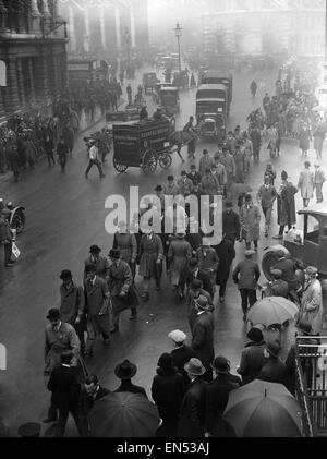 Commuters making their way to work near The Bank in the City of London, on the 8th day of the General Strike.  The national dispute came about after negotiations between the miners and mine owners failed over wages and the strike began on 3 May 1926. The Stock Photo