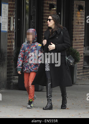 A pregnant Liv Tyler walking her son, Milo to school in Manhattan  Featuring: Liv Tyler,Milo William Langdon Where: New York City, New York, United States When: 24 Oct 2014 Stock Photo