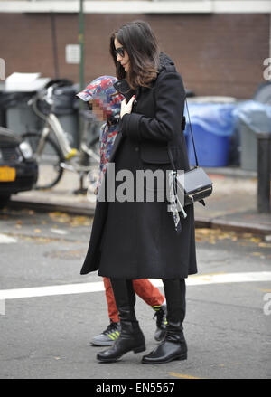 A pregnant Liv Tyler walking her son, Milo to school in Manhattan  Featuring: Liv Tyler,Milo William Langdon Where: New York City, New York, United States When: 24 Oct 2014 Stock Photo