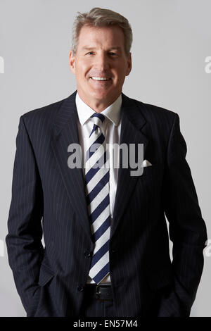 Portrait Of Smiling Mature Businessman Stock Photo