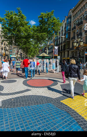 Colorful pavement mosaic by Joan Miro on la Rambla street, Barcelona, Catalonia, Spain Stock Photo