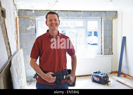 Portrait Of Builder Carrying Out Home Improvements Stock Photo