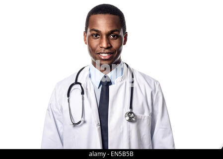 Attractive confident male African doctor wearing a white lab coat and stethoscope looking at the camera Stock Photo