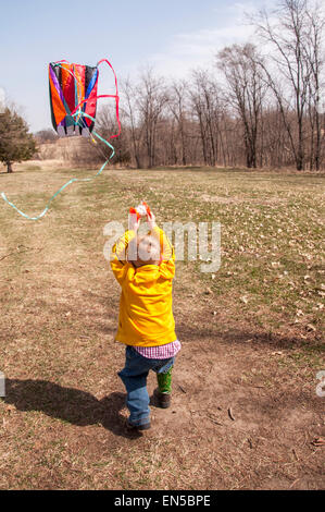 Boy flying kite Stock Photo