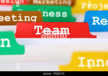 Together community team or teamwork office text on register in business services documents Stock Photo