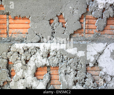 texture of uneven cement wall signs, wall tiles damaged. Stock Photo