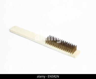 Old Brass wire brush isolated on white background. Stock Photo