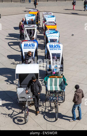 Bicycle Rickshaw drivers wait for customers, for city tour sightseeing, Alexander Square, Stock Photo