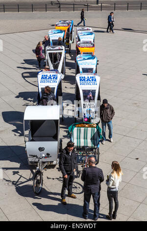 Bicycle Rickshaw drivers wait for customers, for city tour sightseeing, Alexander Square, Stock Photo