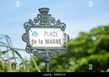 French colonial style sign showing the name 'Place de la Marne', the central square / plaza in Noumea, capital of New Caledonia. Ironwork; cast iron. Stock Photo