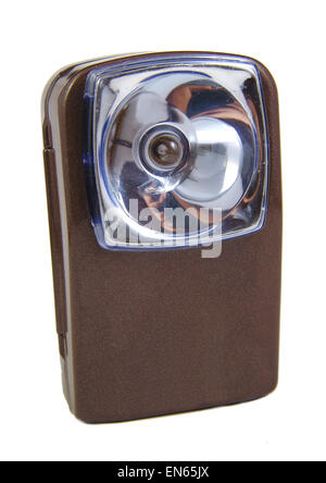 Old electric brown flashlight isolated on white baclground Stock Photo