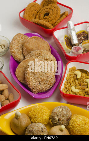 Shankarpali, Chakali, Laddu, Chivda, Namkeen and Anarsa. Typical Diwali snack items, Maharashtra, India. Stock Photo