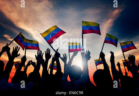 Group of People Waving Venezuelan Flags in Back Lit Stock Photo - Alamy