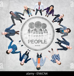 Cheerful Business People Holding Hands Forming a Circle Stock Photo
