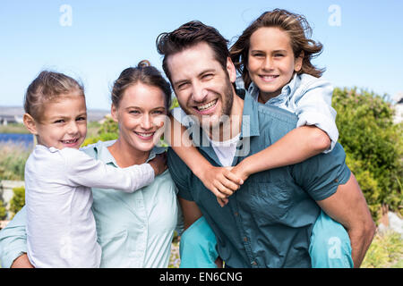 Happy parents with their children Stock Photo
