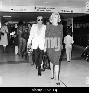 Frank Sinatra and wife Barbara Marx seen here at Heathrow Airport prior to their depature on Concorde for New York. The Sinatra's had been visiting Cairo. 29th September 1979 Stock Photo