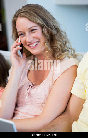 Happy mother on the phone Stock Photo