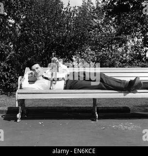 Jazz trumpeter Kenny Ball pictured in London's Embankment gardens during rehearsals. 13th June 1962. Stock Photo