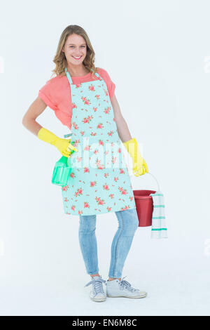 Woman wearing protective gloves and holding bucket Stock Photo