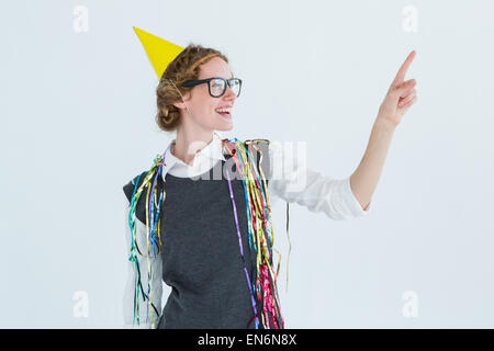 Happy geeky hipster pointing something Stock Photo