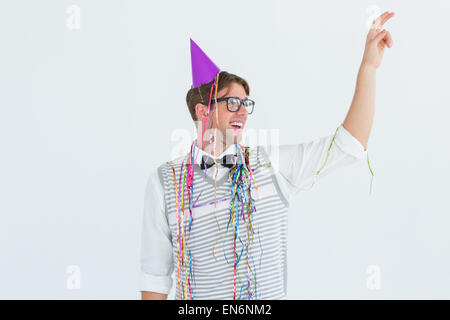 Geeky hipster pointing something Stock Photo