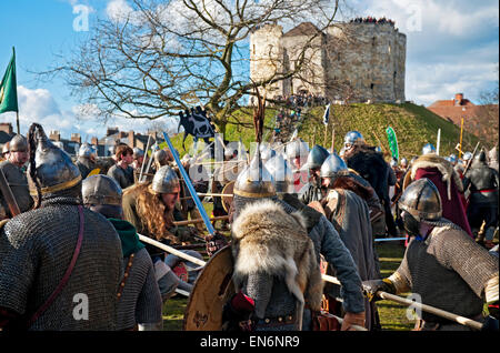 Vikings and Anglo Saxons in combat at the annual Viking Festival near Cliffords Tower York North Yorkshire England UK United Kingdom GB Great Britain Stock Photo