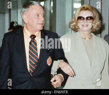 Frank Sinatra and wife Barbara Marx seen here arriving at Heathrow Airport 11th July 1990 Stock Photo