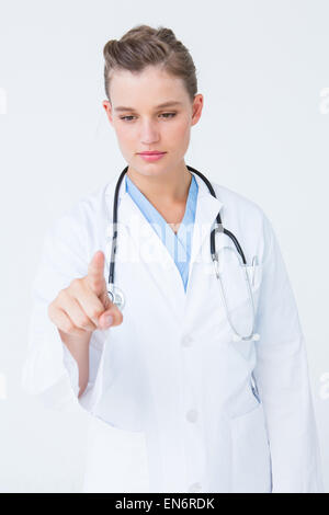 Doctor pointing the finger in the air Stock Photo