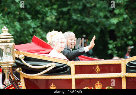HRH Queen Elizabeth II with South African President Nelson Mandela seen here in the state landau in the Mall during their journey to Buckingham Palace, on the first day of his state visit to the United Kingdom 9th July 1996