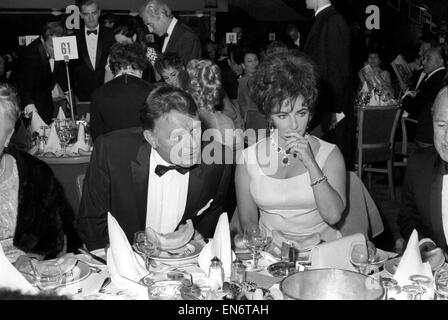 Richard Burton and Elizabeth Taylor seen here receiving best actor and actress awards from Lord Mountbatten. April 1967 Stock Photo