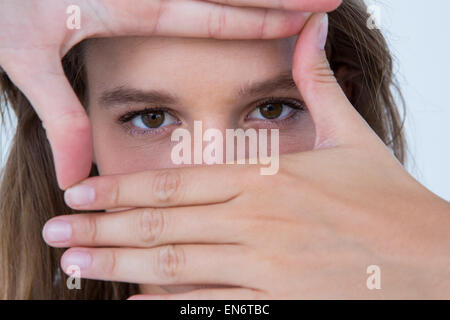 Pretty blonde making frame with her hands Stock Photo