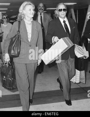 Frank Sinatra and wife Barbara Marx seen here departing Heathrow Airport. Sinatra had been in the United Kingdom for a series concerts. Circa 25th September 1980 Stock Photo