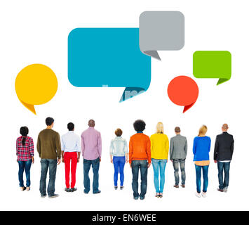 Multiethnic People Facing Backwards with Speech Bubbles Stock Photo