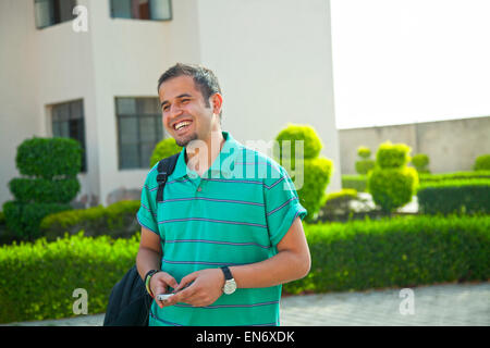 Portrait of graduate student with diploma Stock Photo