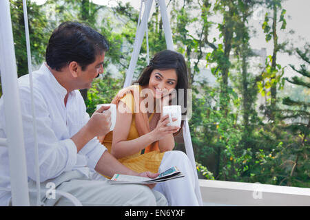Couple having tea together Stock Photo