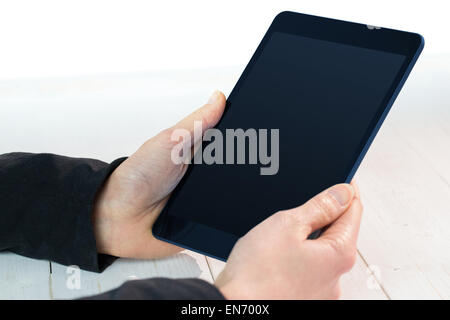 Businesswoman using a tablet pc Stock Photo