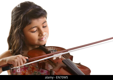 Girl playing violin in front of window at home Stock Photo - Alamy