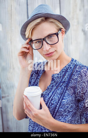 Pretty blonde woman holding goblet Stock Photo