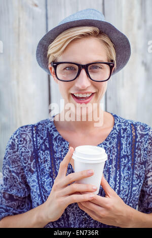 Pretty blonde woman holding goblet Stock Photo