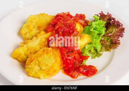 Fried battered fish fillet on white plate Stock Photo