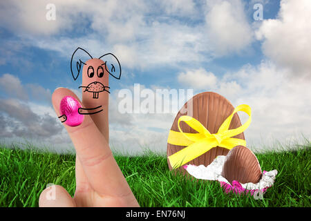 Composite image of fingers as easter bunny Stock Photo