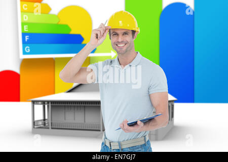 Composite image of architect wearing hard hat while holding clip board Stock Photo