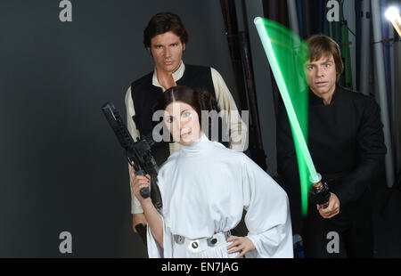 London, UK. 29th Apr, 2015. dpa-exclusive: The wax figures of Han Solo (L-R), Princess Leia, and Luke Skywalker of 'Star Wars' are ready for transport to the exhibition in the Berlin wax museum after production in Merlin Studios in London, Great Britain, 29 April 2015. Eleven heroes and villains from 'Star Wars' will be shown in key scenes from the cult film in authentic and accessible settings at Madame Tussauds in Berlin starting 12 May 2015. Credit:  dpa picture alliance/Alamy Live News Stock Photo