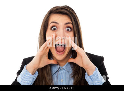 Angry businesswoman yelling, isolated on white background Stock Photo