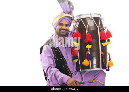 Portrait of Sikh man with drum Stock Photo