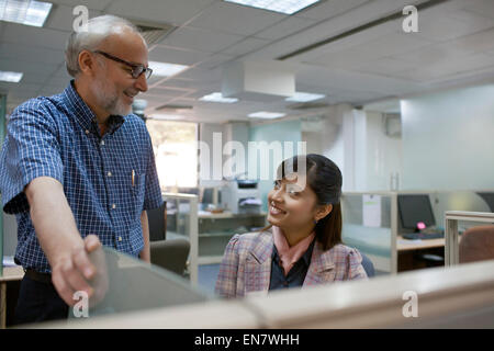 Senior executive with female executive Stock Photo