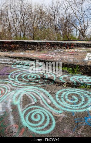 Subsidence cracks on Route 61 or Graffiti Highway in Centralia, PA where a mine fire that began in 1962 continues to burn to this day. Stock Photo