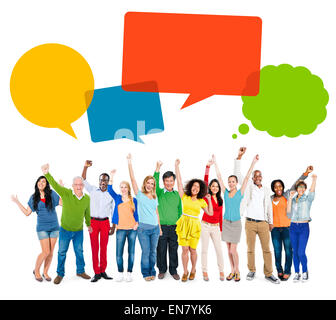 Multiethnic Cheerful People Celebrating with Speech Bubbles Stock Photo