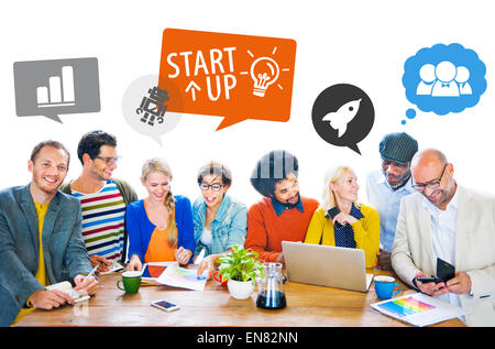 Groupg of Multiethnic Designers in a Meeting with Speech Bubbles Stock Photo
