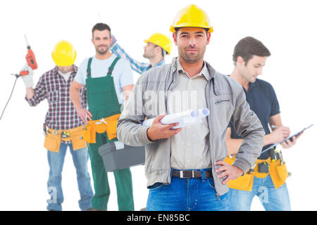 Composite image of architect looking at camera Stock Photo
